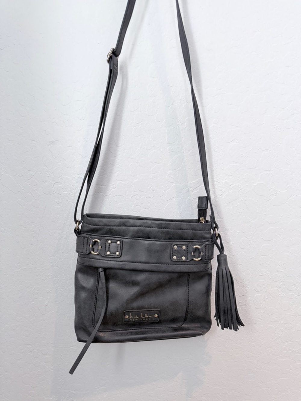 Nicole Miller Black Crossbody with Tassel Detail